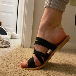 Black strappy sandals.